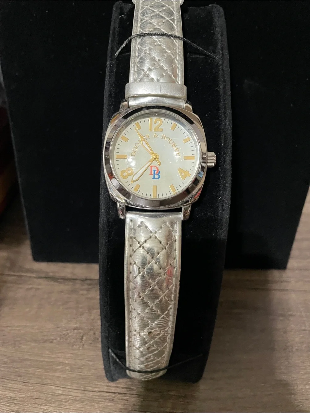 Dooney & Bourke Silver Quilted Leather Strap Watch with Gold Accents.